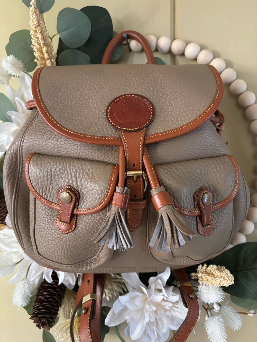 Dooney & Bourke Taupe Pebbled Leather Backpack with Tan Trim